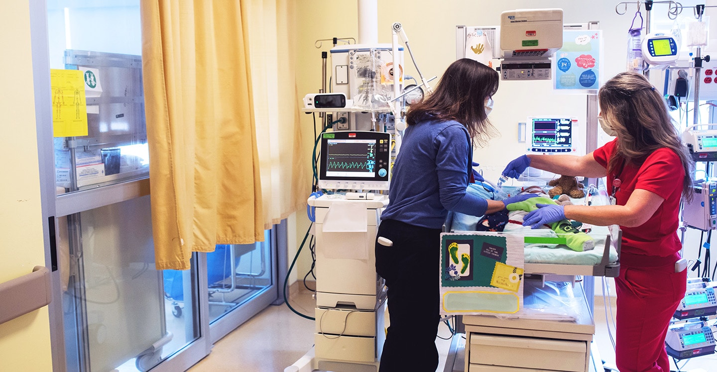 Nurses care for heart patient in the cardiac intensive care unit