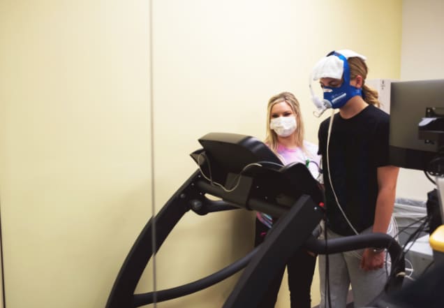 Nurse with patient for cardiac stress test