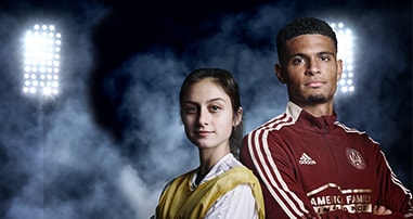 Miles Robinson with teen soccer player