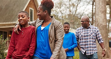 family talking a walk outside
