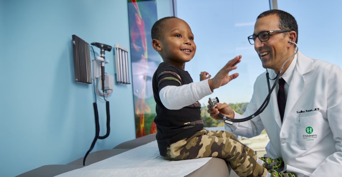 Doctor providing a heart exam