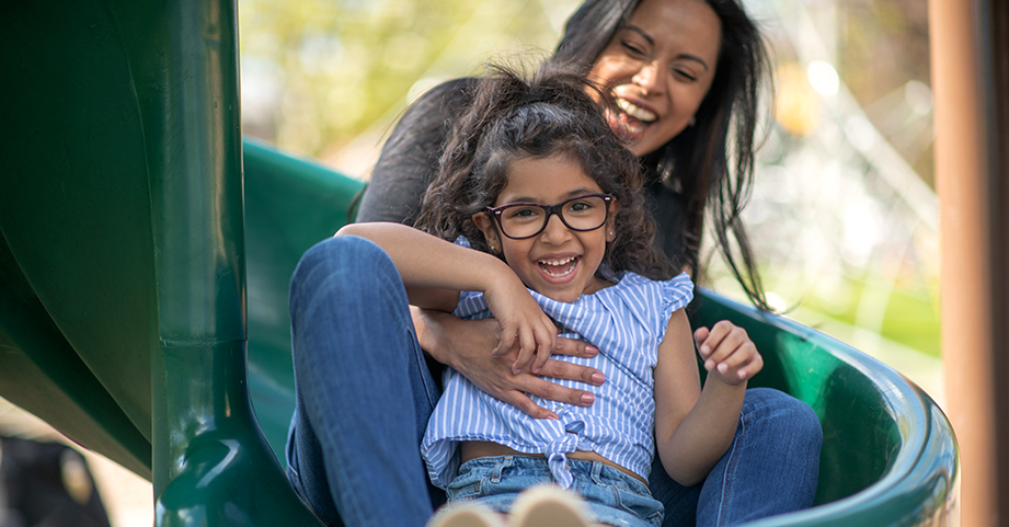 mom with child on playground