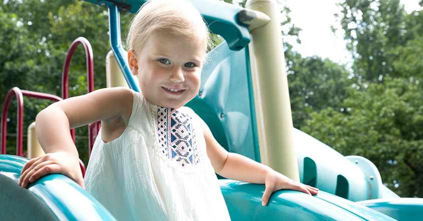 Girl with pediatric leukemia smiling