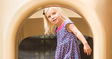 girl on playground at marcus autism center preschool