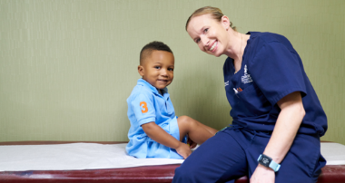 Dr. Flanagan with pediatric patient with hip conditions