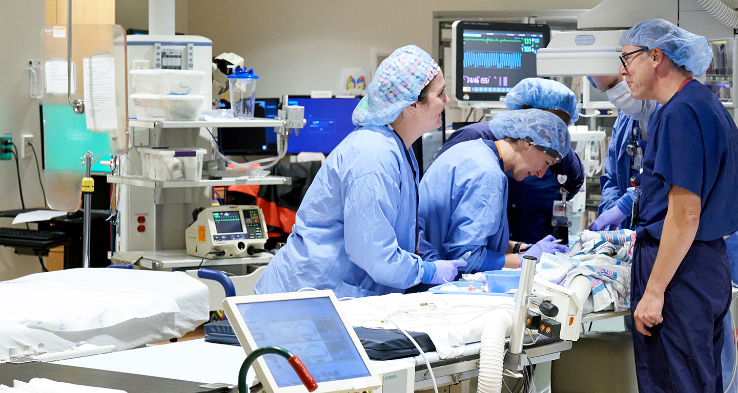 doctors perform pediatric heart procedure