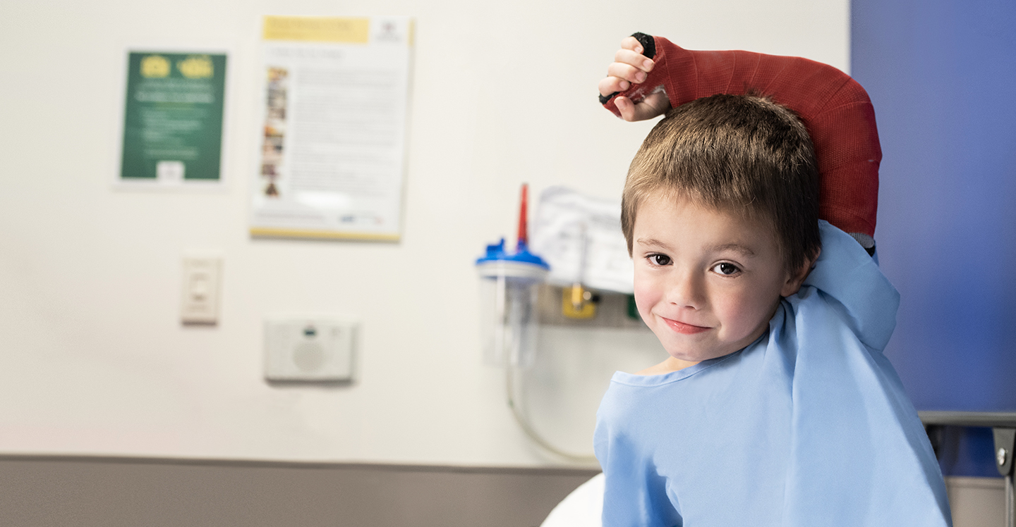 boy receiving pediatric care for broken arm