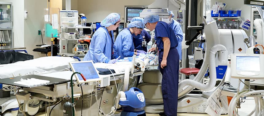 doctor and nurses in hospital catheterization laboratory