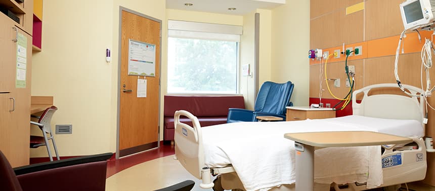 patient room in hospital with bed