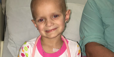 pediatric cancer patient smiling