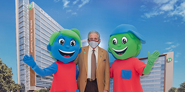 Arthur M. Blank with Children's mascots Hope and Will at hospital naming event
